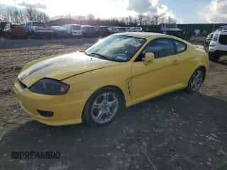 2006 Hyundai Tiburon GT с VIN KMHHN65F96U206869, выставлен на аукционе Copart как лот 45211625 с пробегом 117 415 миль миль и Списание • Salvage title. История ставок и продаж доступна на DreamBid. Изображение 1.