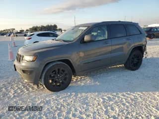 2020 Jeep Grand Cherokee Laredo E with VIN 1C4RJEAG4LC128662, listed as a Copart auction lot 86181855 with 96,073 mi miles and Salvage title. Bid and sale history available at DreamBid. Image 1.