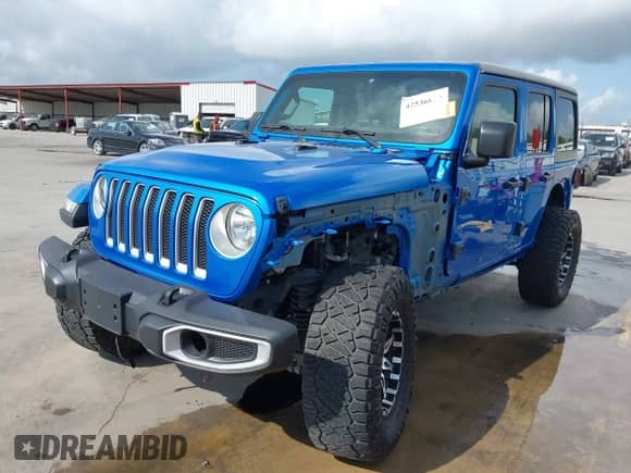2022 Jeep Wrangler Unlimited Sahara with VIN 1C4HJXENXNW118607, listed as a IAAI auction lot 42536834 with 29,917 mi miles and . Bid and sale history available at DreamBid. Image 2.