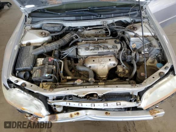 2002 Honda Accord LX с VIN 1HGCG564X2A064108, выставлен на аукционе Copart как лот 61826185 с пробегом 228 317 миль миль и Списание • Salvage title. История ставок и продаж доступна на DreamBid. Изображение 11.