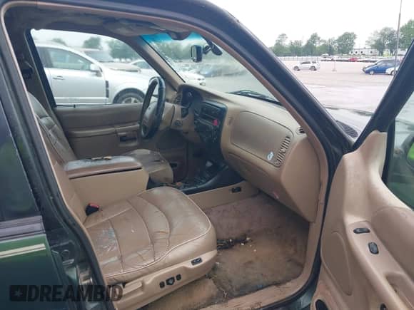1998 Ford Explorer XLT с VIN 1FMZU35P1WZA75454, выставлен на аукционе IAAI как лот 42360349 с пробегом 169 560 миль миль и . История ставок и продаж доступна на DreamBid. Изображение 5.