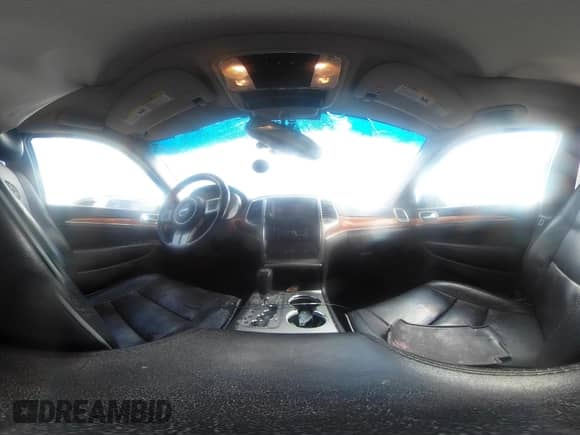 2012 Jeep Grand Cherokee Overland with VIN 1C4RJECG4CC281877, listed as a IAAI auction lot 42705725 with 251,264 mi miles and . Bid and sale history available at DreamBid. Image 21.