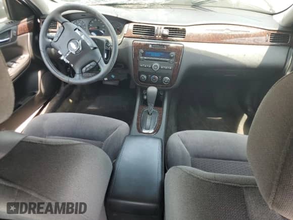 2013 Chevrolet Impala LS z VIN 2G1WF5E3XD1117192, wystawiony jako Copart lot #65714295 z przebiegiem 74 236 mil mil oraz Szkoda całkowita • Salvage title. Historia ofert i sprzedaży dostępna na DreamBid. Obrazek 8.