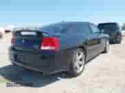 2010 Dodge Charger R/T with VIN 2B3CA8CT5AH257815, listed as a IAAI auction lot 43182487 with 204,730 mi miles and . Bid and sale history available at DreamBid. Image 4.