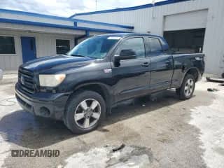 2011 Toyota Tundra с VIN 5TFRY5F14BX109777, выставлен на аукционе Copart как лот 71804345 с пробегом 278 864 миль миль и Списание • Salvage title. История ставок и продаж доступна на DreamBid. Изображение 1.