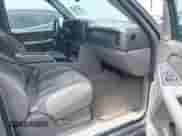 2005 Chevrolet Tahoe Z71 z VIN 1GNEC13T15R160794, wystawiony jako IAAI lot #42424949 z przebiegiem 105 634 mil mil oraz . Historia ofert i sprzedaży dostępna na DreamBid. Obrazek 5.