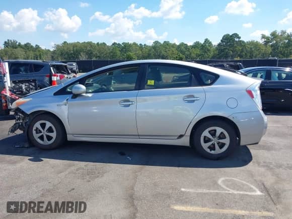 2012 Toyota Prius Three with VIN JTDKN3DU9C5390001, listed as a IAAI auction lot 43099149 with 127,598 mi miles and . Bid and sale history available at DreamBid. Image 15.