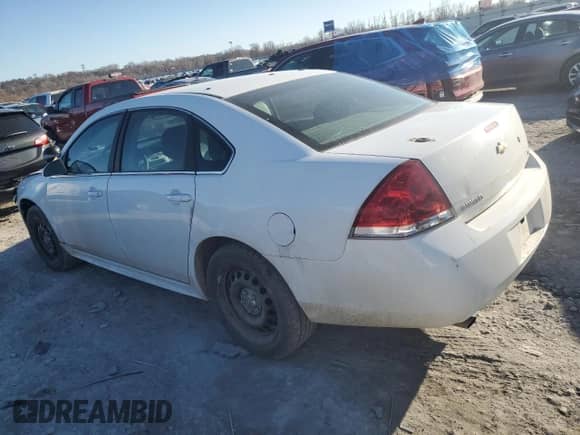 2012 Chevrolet Impala Police Police with VIN 2G1WD5E31C1151753, listed as a Copart auction lot 46351215 with 128,468 mi miles and Salvage title. Bid and sale history available at DreamBid. Image 2.