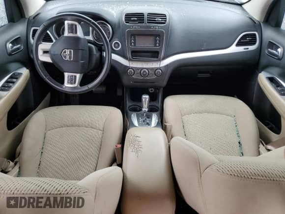 2012 Dodge Journey American Value с VIN 3C4PDCAB1CT169939, выставлен на аукционе Copart как лот 65083445 с пробегом 180 035 миль миль и Списание • Salvage title. История ставок и продаж доступна на DreamBid. Изображение 8.