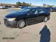 2013 Toyota Camry LE z VIN 4T1BD1FK0DU092684, wystawiony jako Copart lot #84999485 z przebiegiem 458 354 mil mil oraz Czysty tytuł • Clean title. Historia ofert i sprzedaży dostępna na DreamBid. Obrazek 1.