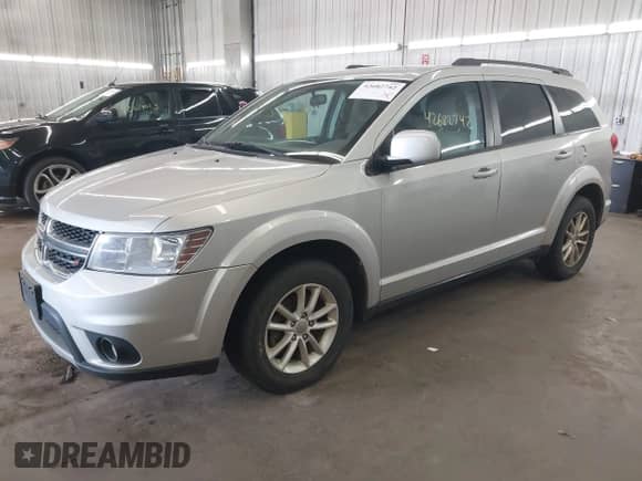 2014 Dodge Journey SXT with VIN 3C4PDCBG9ET270532, listed as a IAAI auction lot 42682742 with 238,129 mi miles and . Bid and sale history available at DreamBid. Image 2.