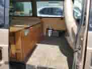 2001 Chevrolet Astro с VIN 1GNEL19W31B145637, выставлен на аукционе Copart как лот 69019755 с пробегом 295 654 миль миль и Списание • Salvage title. История ставок и продаж доступна на DreamBid. Изображение 11.