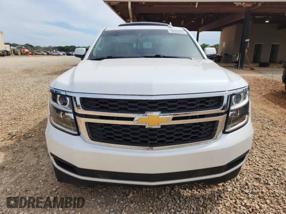 2016 Chevrolet Suburban LT с VIN 1GNSKHKC8GR138407, выставлен на аукционе Copart как лот 70026755 с пробегом 98 957 миль миль и Списание • Salvage title. История ставок и продаж доступна на DreamBid. Изображение 5.