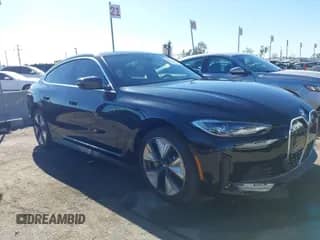 2024 BMW i4 eDrive40 with VIN WBY73AW06RFS52041, listed as a IAAI auction lot 41320110 with 21,810 mi miles and . Bid and sale history available at DreamBid. Image 1.