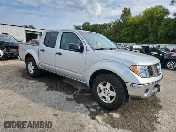 2007 Nissan Frontier SE with VIN 1N6AD07U07C409008, listed as a Copart auction lot 84583755 with 246,686 mi miles and Salvage title. Bid and sale history available at DreamBid. Image 4.