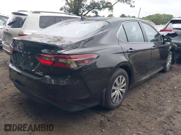2022 Toyota Camry Hybrid LE with VIN 4T1C31AK3NU570645, listed as a IAAI auction lot 42659916 with 19,420 mi miles and . Bid and sale history available at DreamBid. Image 4.