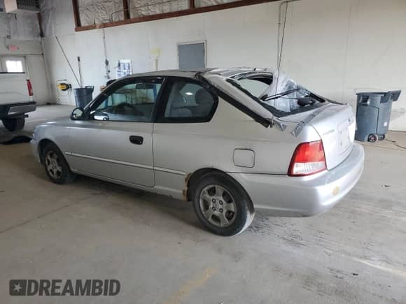 2002 Hyundai Accent GS z VIN KMHCG35C32U190168, wystawiony jako Copart lot #71414935 z przebiegiem 205 445 mil mil oraz Szkoda całkowita • Salvage title. Historia ofert i sprzedaży dostępna na DreamBid. Obrazek 2.