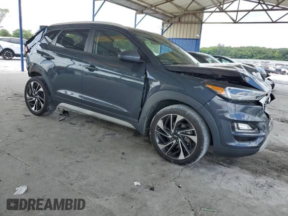 2021 Hyundai Tucson SEL with VIN KM8J33AL5MU290378, listed as a Copart auction lot 65156005 with 67,488 mi miles and Salvage title. Bid and sale history available at DreamBid. Image 4.