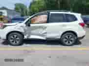 2018 Subaru Forester Premium z VIN JF2SJAGC9JH465554, wystawiony jako IAAI lot #42656773 z przebiegiem Nie podano mil oraz . Historia ofert i sprzedaży dostępna na DreamBid. Obrazek 13.