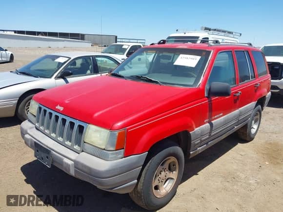 1996 Jeep Grand Cherokee Laredo z VIN 1J4GZ58Y5TC183677, wystawiony jako IAAI lot #42582989 z przebiegiem 187 453 mil mil oraz . Historia ofert i sprzedaży dostępna na DreamBid. Obrazek 2.