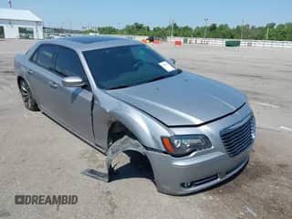 2014 Chrysler 300 S with VIN 2C3CCABG7EH272654, listed as a IAAI auction lot 43147657 with 202,449 mi miles and . Bid and sale history available at DreamBid. Image 1.