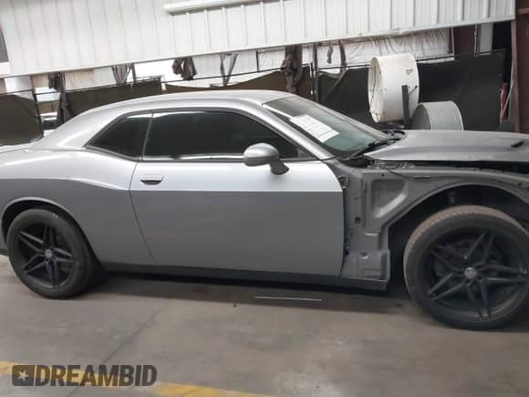 2018 Dodge Challenger SXT Plus с VIN 2C3CDZAG1JH144904, выставлен на аукционе IAAI как лот 43345739 с пробегом 79 225 миль миль и . История ставок и продаж доступна на DreamBid. Изображение 14.