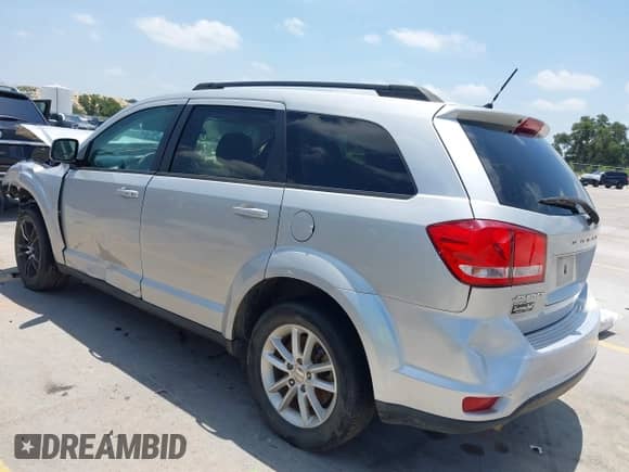 2014 Dodge Journey SXT with VIN 3C4PDDBG8ET108509, listed as a IAAI auction lot 42707419 with 88,125 mi miles and . Bid and sale history available at DreamBid. Image 3.