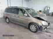 2008 Honda Odyssey EX-L with VIN 5FNRL38658B402974, listed as a IAAI auction lot 43008013 with 220,738 mi miles and . Bid and sale history available at DreamBid. Image 1.