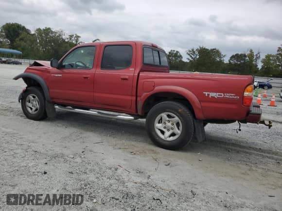 2002 Toyota Tacoma PreRunner z VIN 5TEGN92N42Z120044, wystawiony jako Copart lot #81899385 z przebiegiem 219 836 mil mil oraz Szkoda całkowita • Salvage title. Historia ofert i sprzedaży dostępna na DreamBid. Obrazek 2.