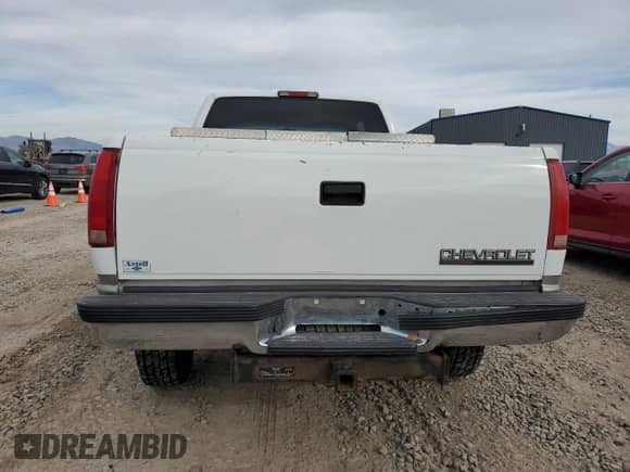 1998 Chevrolet Silverado 2500 с VIN 1GCGK29J7WE205052, выставлен на аукционе Copart как лот 77227114 с пробегом 170 220 миль миль и Чистый • Clean title. История ставок и продаж доступна на DreamBid. Изображение 6.