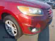 2011 Hyundai Santa Fe SE z VIN 5XYZH4AG7BG049597, wystawiony jako IAAI lot #43013333 z przebiegiem 197 444 mil mil oraz . Historia ofert i sprzedaży dostępna na DreamBid. Obrazek 12.