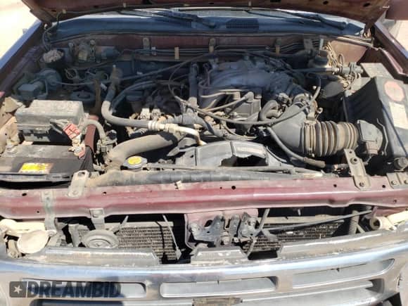 1997 Nissan Pathfinder XE with VIN JN8AR05S5VW120101, listed as a Copart auction lot 80290434 with 298,384 mi miles and Salvage title. Bid and sale history available at DreamBid. Image 12.