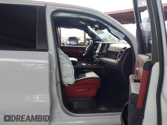 2022 Ram 1500 Rebel with VIN 1C6SRFLT3NN406752, listed as a IAAI auction lot 43346803 with 46,781 mi miles and . Bid and sale history available at DreamBid. Image 5.