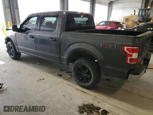 2018 Ford F-150 XLT z VIN 1FTEW1EPXJFD61668, wystawiony jako Copart lot #84369465 z przebiegiem 121 612 mil mil oraz Szkoda całkowita • Salvage title. Historia ofert i sprzedaży dostępna na DreamBid. Obrazek 2.