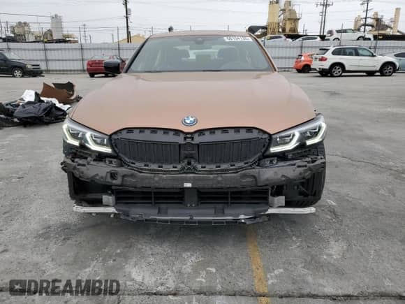2022 BMW 3 Series 330e xDrive z VIN WBA5P9C05NFM75095, wystawiony jako Copart lot #68733985 z przebiegiem 13 462 mil mil oraz Szkoda całkowita • Salvage title. Historia ofert i sprzedaży dostępna na DreamBid. Obrazek 5.