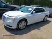 2013 Chrysler 300 with VIN 2C3CCARGXDH669215, listed as a IAAI auction lot 42458243 with 156,880 mi miles and . Bid and sale history available at DreamBid. Image 2.