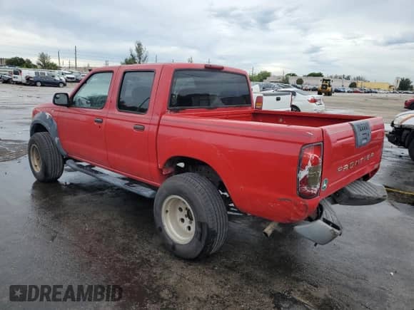 2001 Nissan Frontier SE with VIN 1N6ED27T71C314764, listed as a Copart auction lot 86176435 with Not provided miles and Salvage title. Bid and sale history available at DreamBid. Image 2.