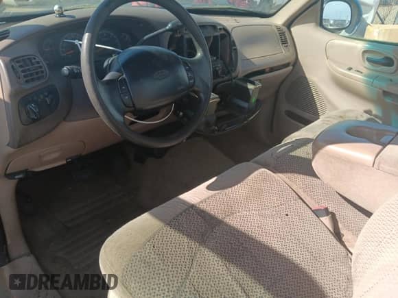 1999 Ford F-150 с VIN 2FTRF08L4XCA23787, выставлен на аукционе Copart как лот 54982305 с пробегом 188 594 миль миль и На запчасти • Non repairable. История ставок и продаж доступна на DreamBid. Изображение 8.