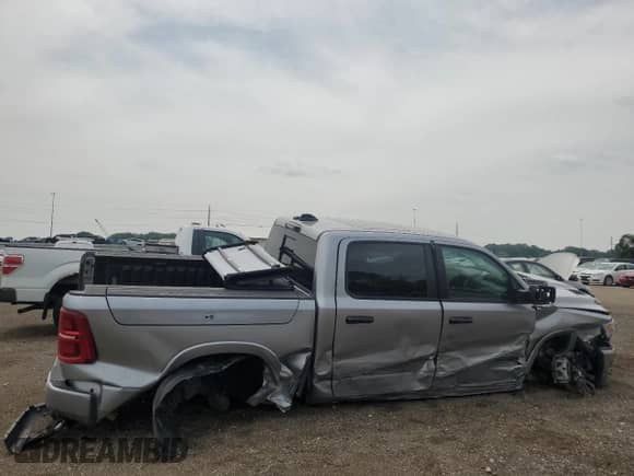 2025 Ram 1500 Limited z VIN 1C6SRFHP2SN653462, wystawiony jako Copart lot #59121005 z przebiegiem 4 257 mil mil oraz Szkoda całkowita • Salvage title. Historia ofert i sprzedaży dostępna na DreamBid. Obrazek 3.