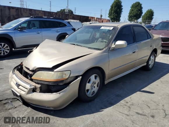 2002 Honda Accord EX with VIN 1HGCG165X2A006565, listed as a Copart auction lot 71033755 with Not provided miles and Salvage title. Bid and sale history available at DreamBid. Image 1.