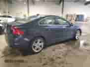 2015 Volvo S60 T5 Drive-E Premier with VIN YV126MFK9F1354636, listed as a Copart auction lot 61228855 with 143,125 mi miles and Salvage title. Bid and sale history available at DreamBid. Image 3.