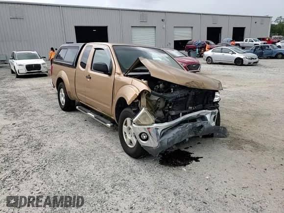 2005 Nissan Frontier SE with VIN 1N6AD06U75C413684, listed as a Copart auction lot 65918035 with 227,818 mi miles and Salvage title. Bid and sale history available at DreamBid. Image 14.