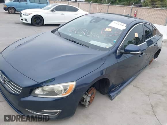 2015 Volvo S60 T5 Drive-E Premier with VIN YV126MFK0F2334740, listed as a IAAI auction lot 41480551 with Not provided miles and . Bid and sale history available at DreamBid. Image 6.