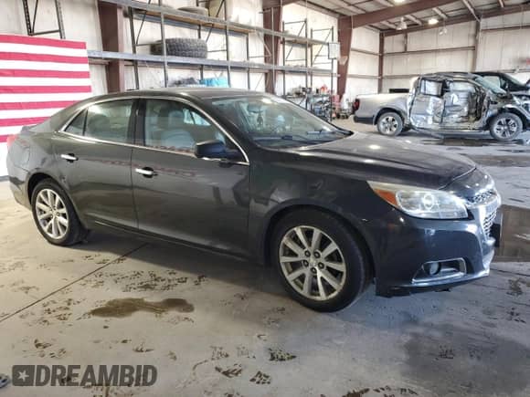 2015 Chevrolet Malibu LTZ with VIN 1G11F5SL8FF203529, listed as a Copart auction lot 82562415 with 176,002 mi miles and Clean title. Bid and sale history available at DreamBid. Image 4.