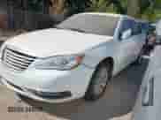 2014 Chrysler 200 LX with VIN 1C3CCBAB0EN238204, listed as a IAAI auction lot 43376618 with 185,750 mi miles and . Bid and sale history available at DreamBid. Image 2.