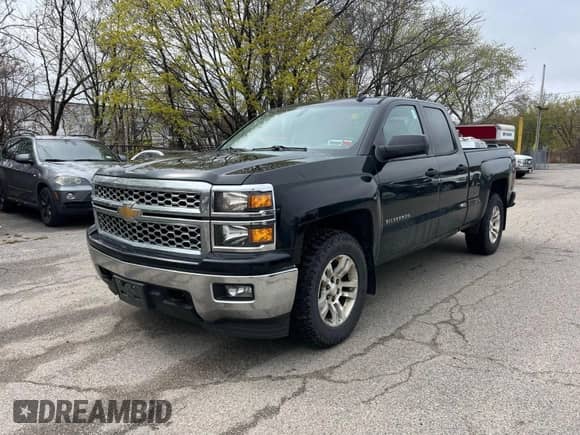 2014 Chevrolet Silverado 1500 LT z VIN 1GCVKREH1EZ169899, wystawiony jako IAAI lot #42143501 z przebiegiem 124 789 mil mil oraz . Historia ofert i sprzedaży dostępna na DreamBid. Obrazek 2.