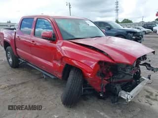 2022 Toyota Tacoma SR with VIN 3TMCZ5AN9NM523743, listed as a IAAI auction lot 42970764 with 57,305 mi miles and . Bid and sale history available at DreamBid. Image 1.