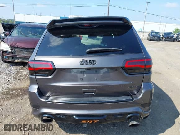 2016 Jeep Grand Cherokee SRT with VIN 1C4RJFDJ7GC359753, listed as a IAAI auction lot 42998753 with 88,855 mi miles and . Bid and sale history available at DreamBid. Image 17.