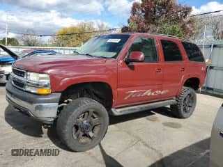 2001 Chevrolet Tahoe LT z VIN 1GNEK13T31R121315, wystawiony jako Copart lot #82618445 z przebiegiem 212 104 mil mil oraz Szkoda całkowita • Salvage title. Historia ofert i sprzedaży dostępna na DreamBid. Obrazek 1.
