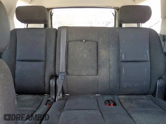 2010 Chevrolet Tahoe LS z VIN 1GNUCAE01AR288249, wystawiony jako Copart lot #71568515 z przebiegiem Nie podano mil oraz Szkoda całkowita • Salvage title. Historia ofert i sprzedaży dostępna na DreamBid. Obrazek 10.